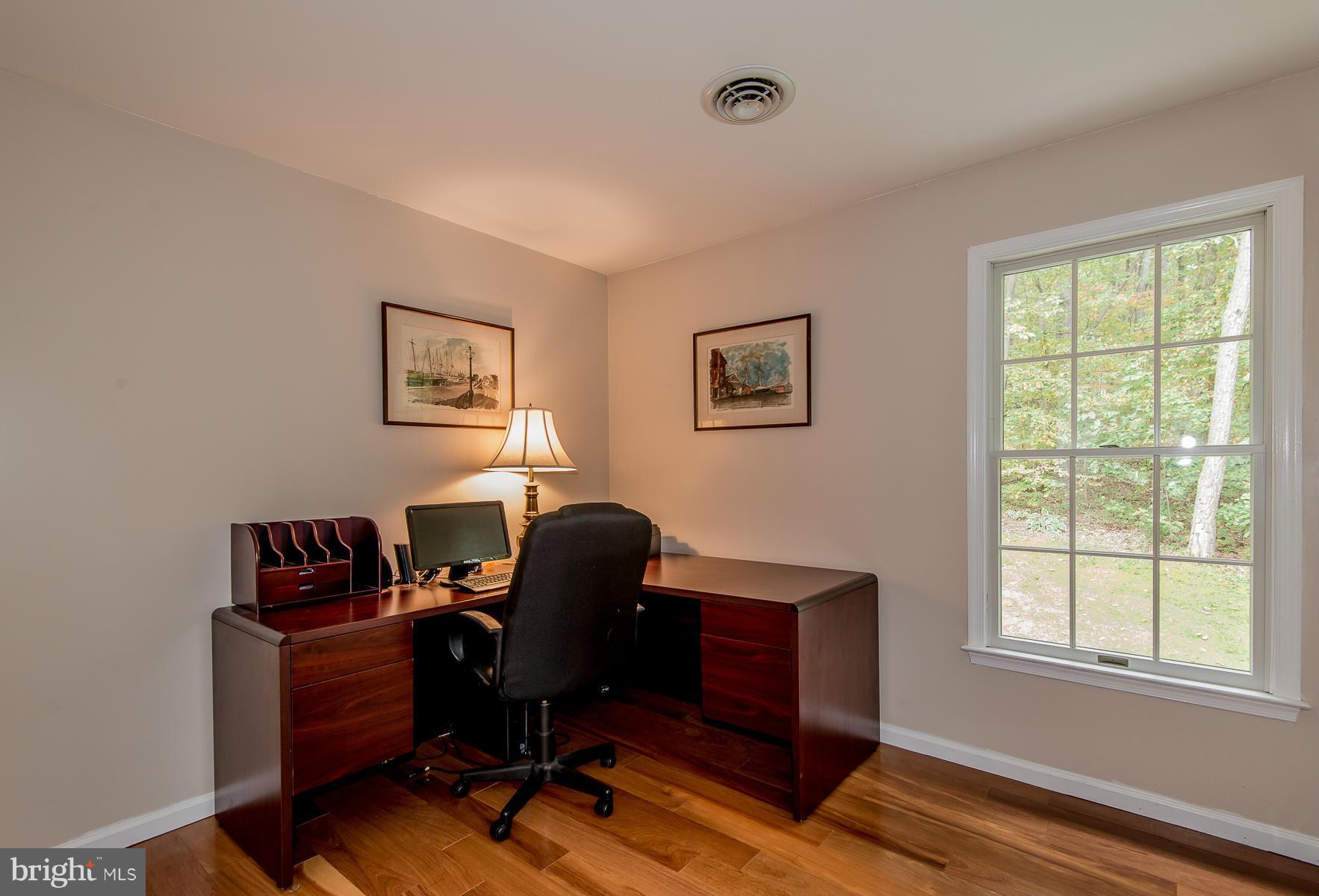 5749 Buffalo Road Mount Airy, MD 21771 - Photo 22 of 30 a view of a workspace with furniture and a window