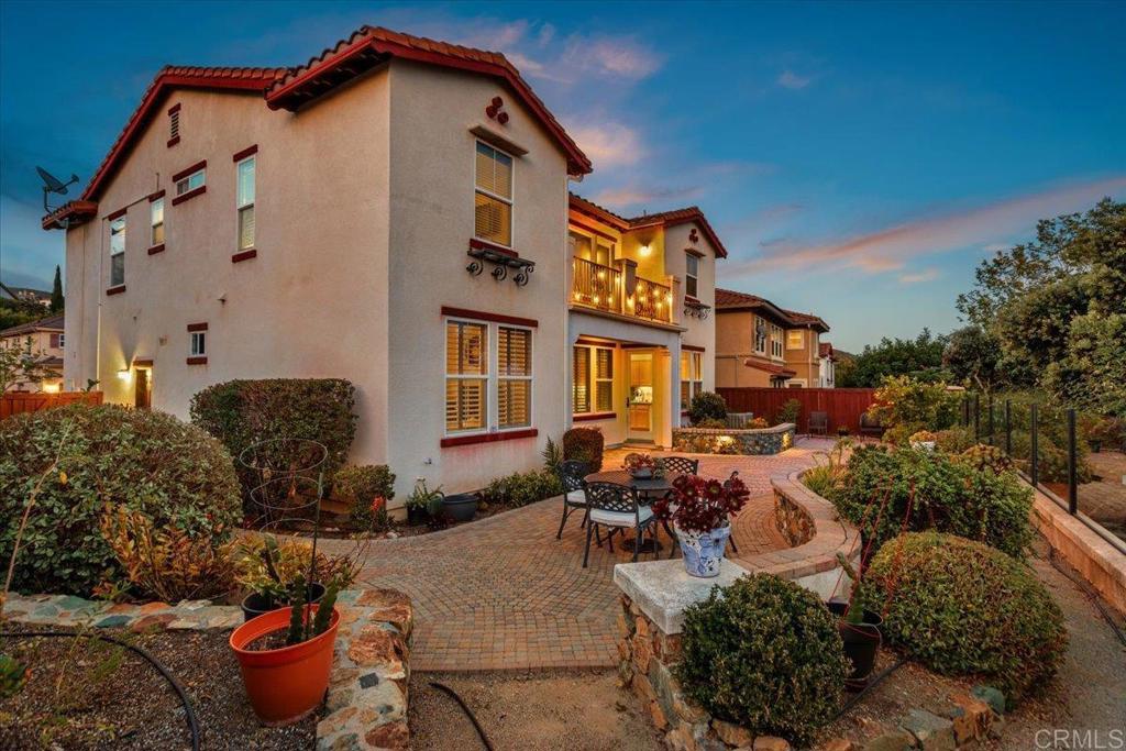 838 Luminara Way San Marcos, CA 92078 - Photo 5 of 54 a front view of a house with patio