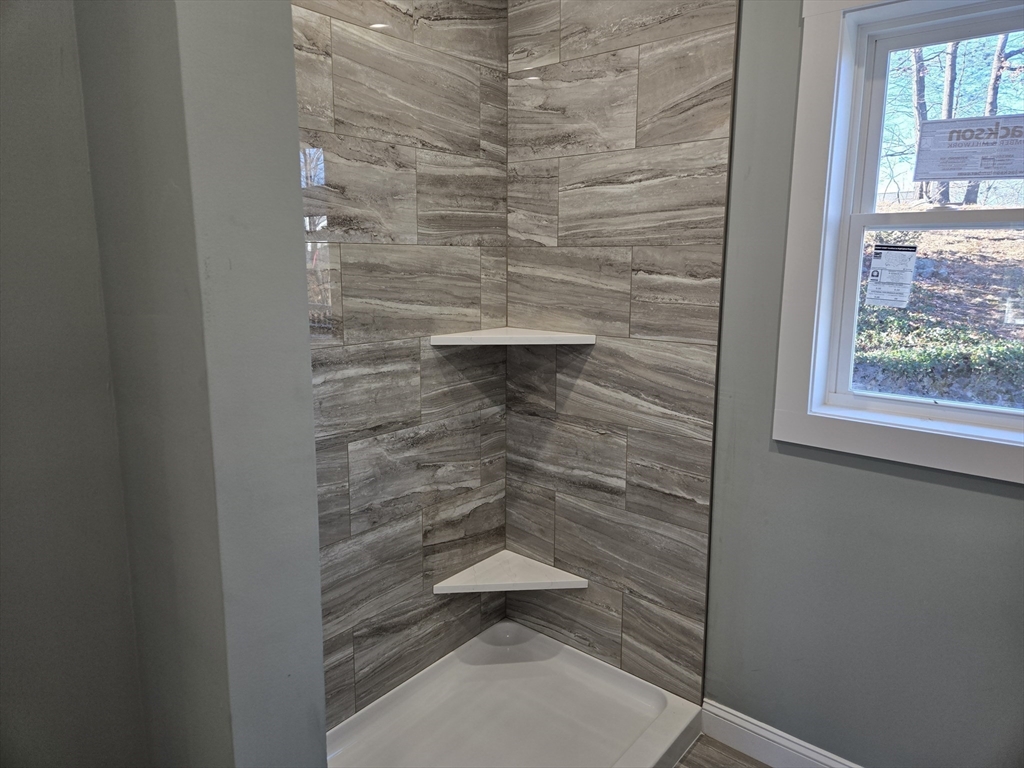 39 Tamarock Terrace Stoneham, MA 02180 - Photo 9 of 13 a bathroom with a shower