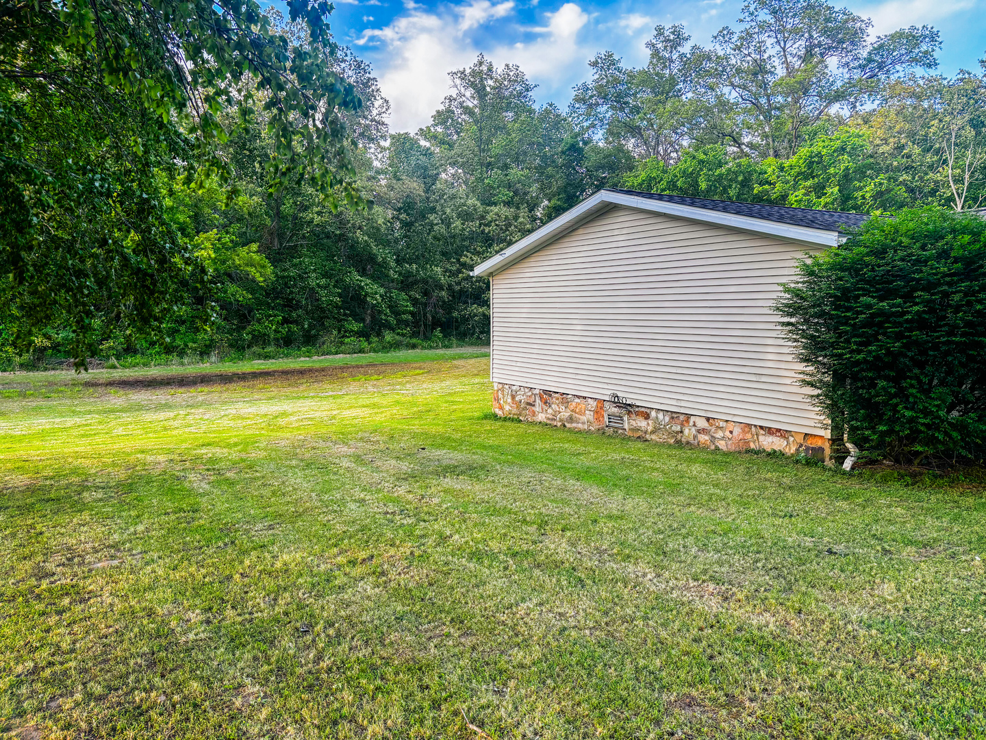 4920 Mt Moriah Road Galatia, IL 62935 - Photo 7 of 33 a view of a backyard with a garden and entertaining space