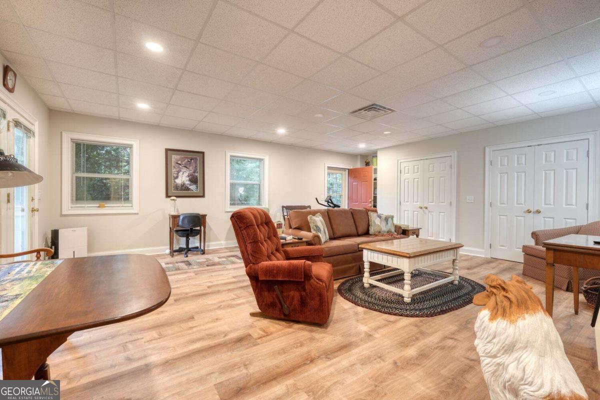 523 Sunnyside Shores Road Hiawassee, GA 30546 - Photo 28 of 55 a living room with furniture window and wooden floor