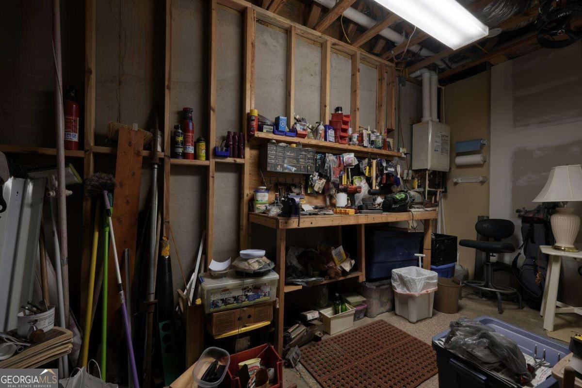 523 Sunnyside Shores Road Hiawassee, GA 30546 - Photo 32 of 55 a view of people chairs and fruits