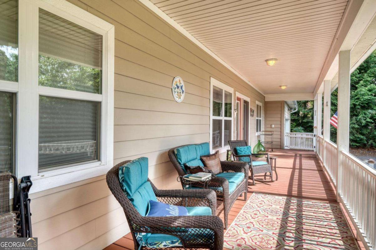 523 Sunnyside Shores Road Hiawassee, GA 30546 - Photo 41 of 55 a building outdoor space with patio furniture