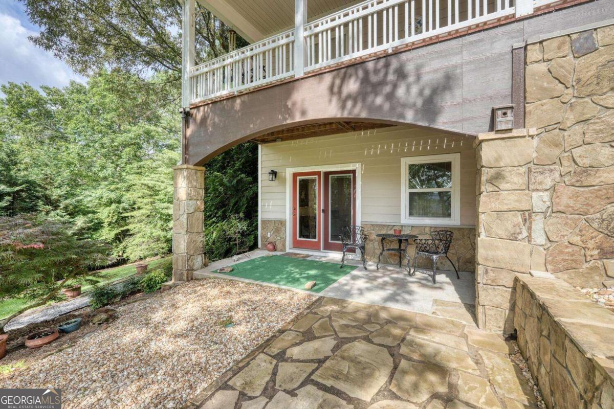 523 Sunnyside Shores Road Hiawassee, GA 30546 - Photo 42 of 55 a view of house with outdoor space and porch