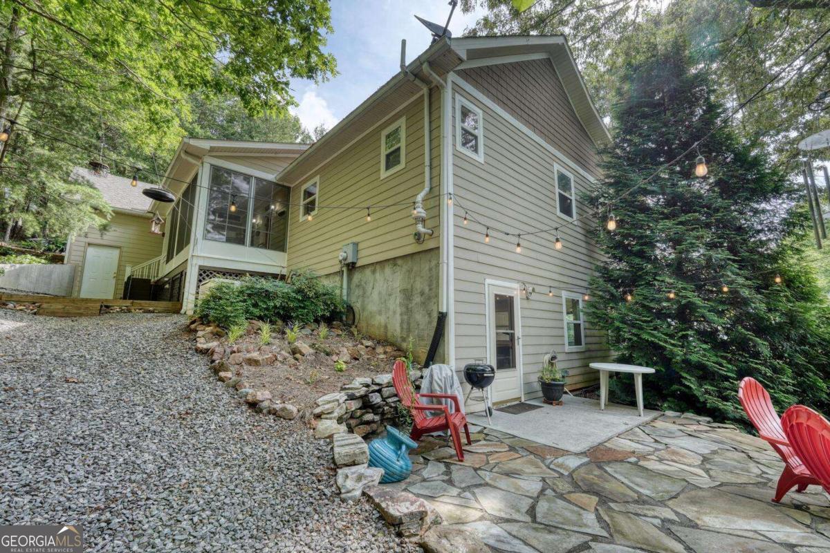 523 Sunnyside Shores Road Hiawassee, GA 30546 - Photo 47 of 55 a view of a house with a patio