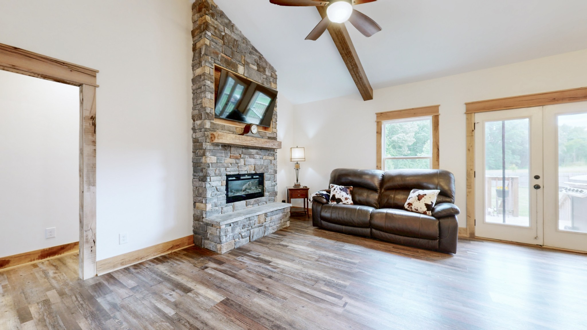 601 King Ridge Road Dowelltown, TN 37059 - Photo 10 of 49 a living room with furniture and a fireplace