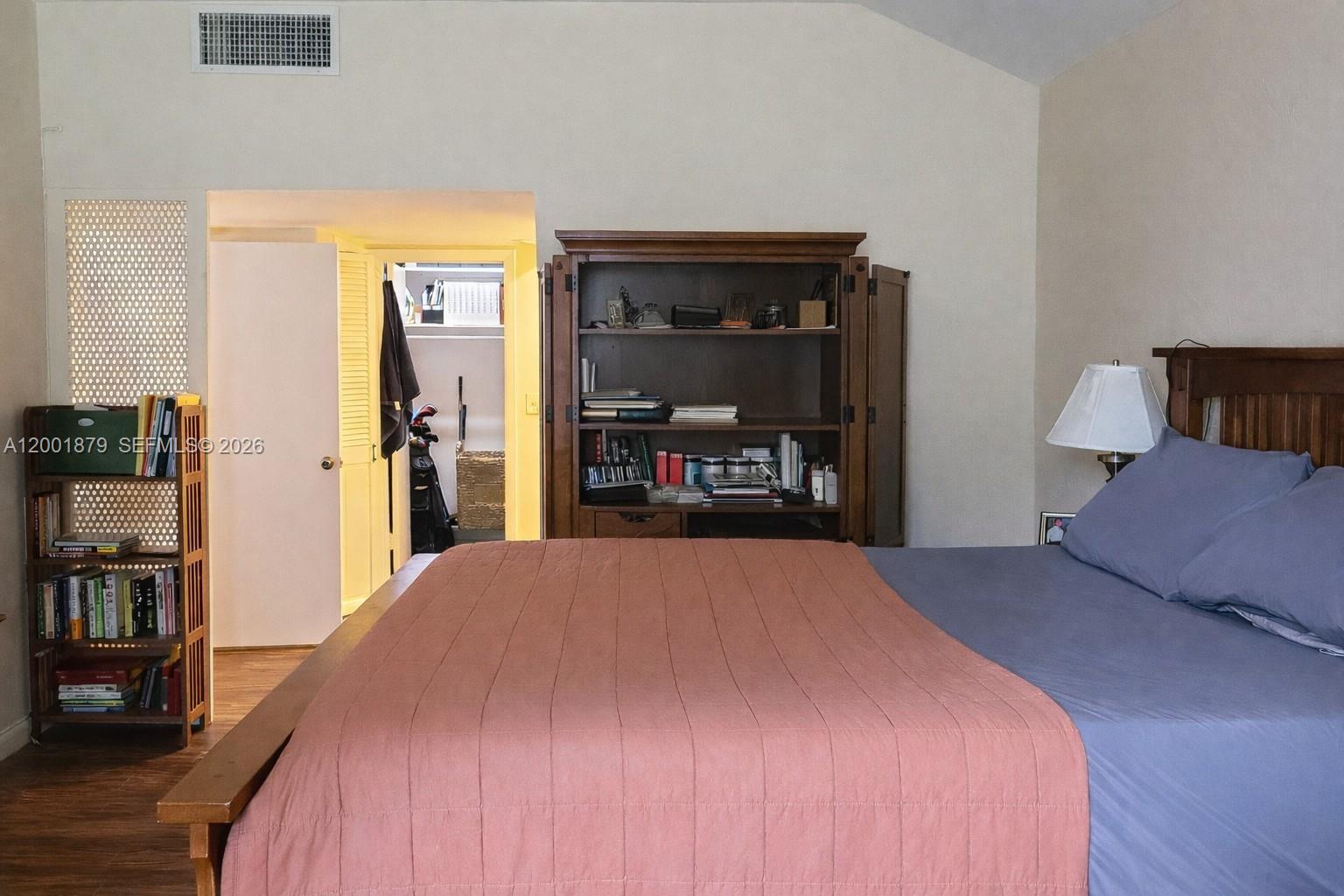 5524 Constant Spring Terrace, Unit 213 Lauderhill, FL 33319 - Photo 11 of 16 a bed room with a bed and a chair