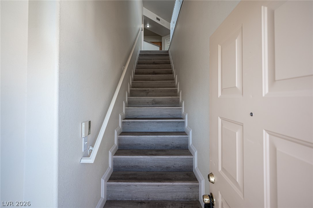 8555 West Russell Road, Unit 2062 Las Vegas, NV 89113 - Photo 4 of 35 Ascend to comfort with this inviting entryway leading to upper living spaces.