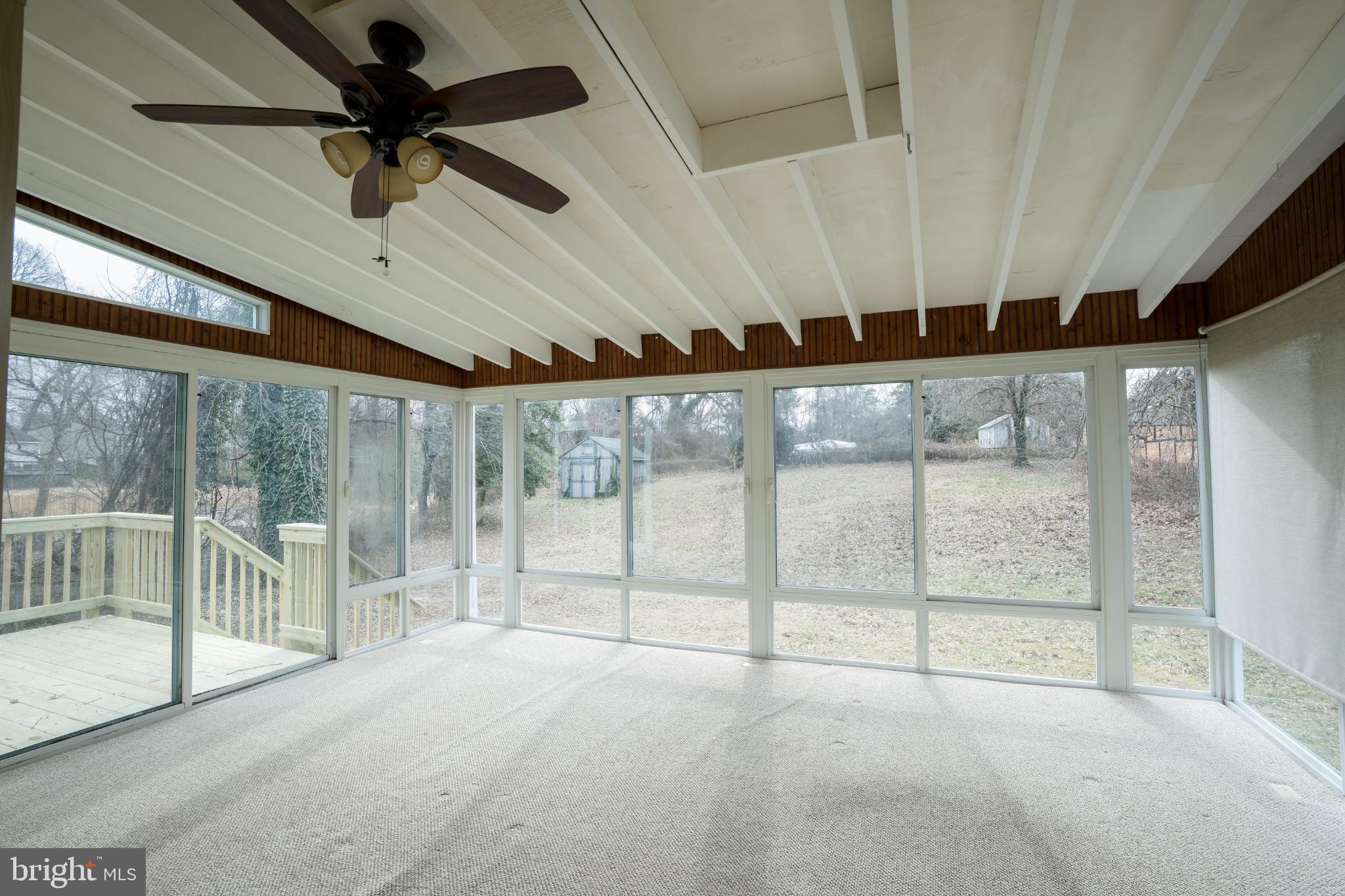 263 Riverdale Road Severna Park, MD 21146 - Photo 28 of 30 Bright sunroom with scenic outdoor views.