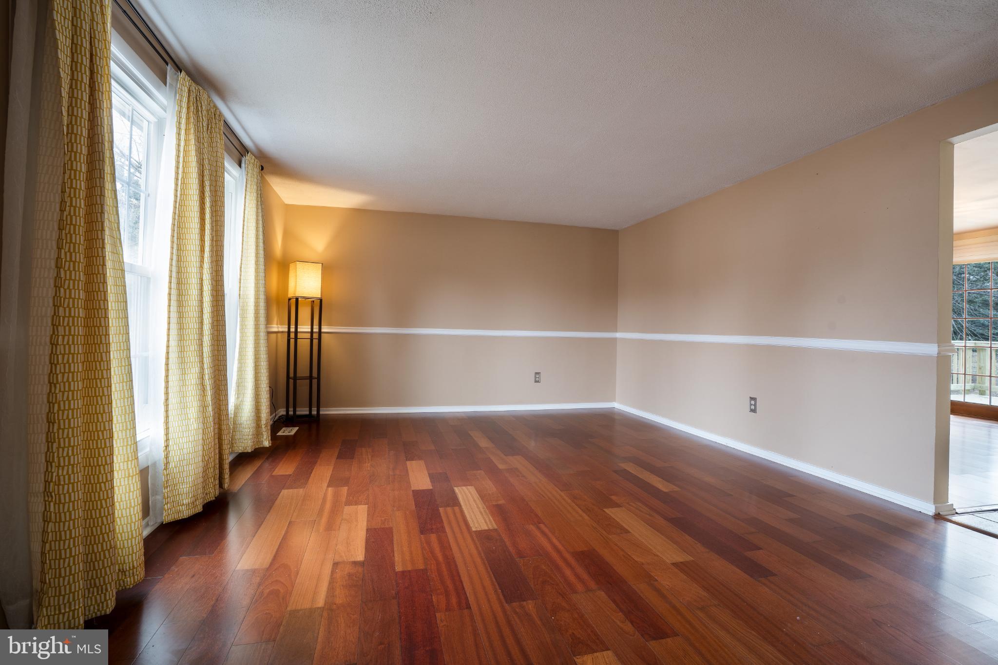 263 Riverdale Road Severna Park, MD 21146 - Photo 6 of 30 Spacious room with warm wooden floors.