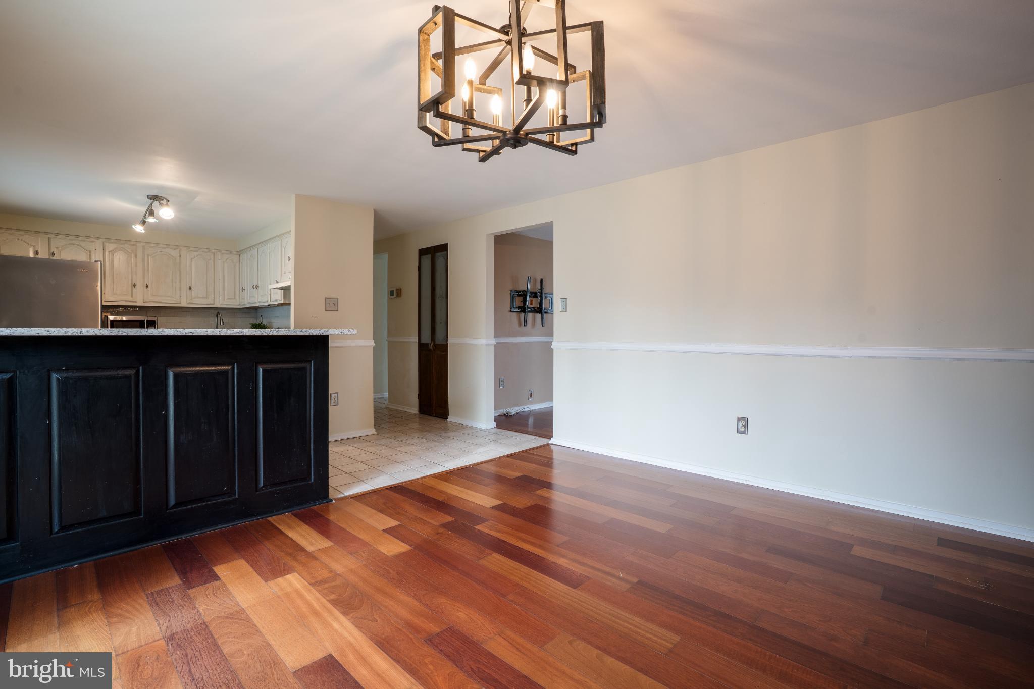 263 Riverdale Road Severna Park, MD 21146 - Photo 9 of 30 Elegant open space with rich hardwood floors.