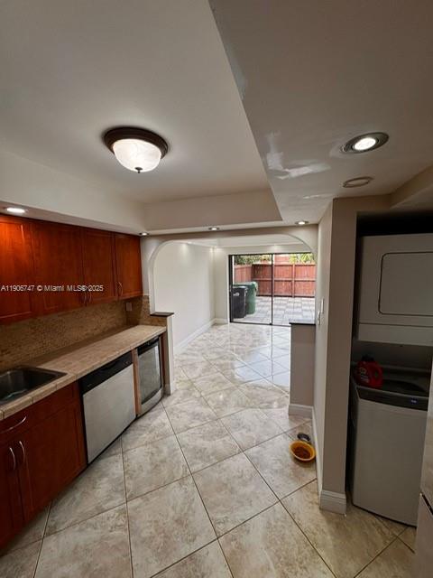 6724 Southwest 114th Place, Unit F Miami, FL 33173 - Photo 11 of 27 a kitchen with stainless steel appliances granite countertop a refrigerator and a stove