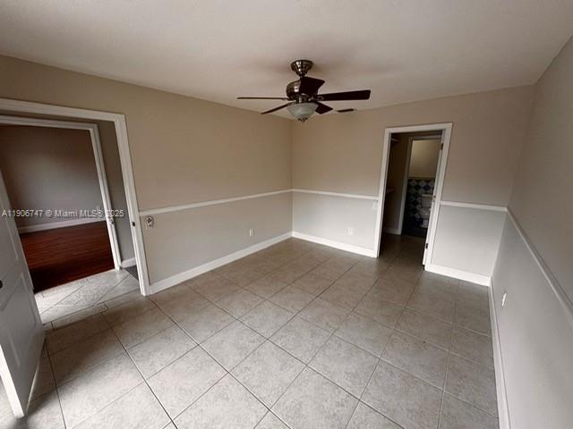 6724 Southwest 114th Place, Unit F Miami, FL 33173 - Photo 17 of 27 an empty room with a empty space