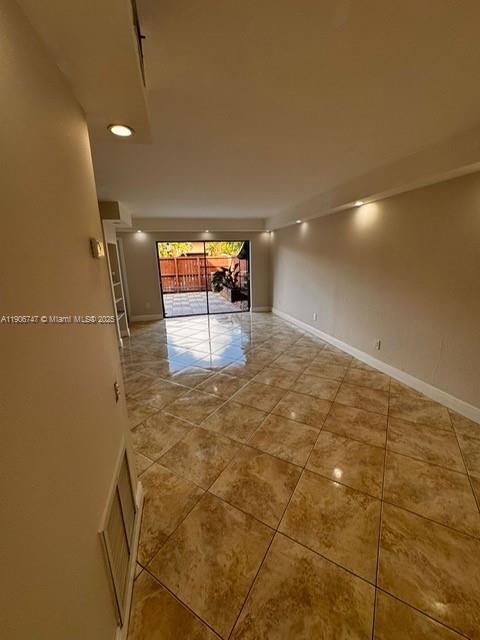 6724 Southwest 114th Place, Unit F Miami, FL 33173 - Photo 18 of 27 a view of a hallway