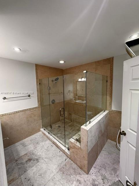 6724 Southwest 114th Place, Unit F Miami, FL 33173 - Photo 27 of 27 a bathroom with a shower and a sink