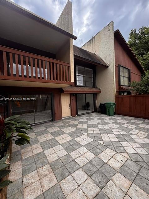 6724 Southwest 114th Place, Unit F Miami, FL 33173 - Photo 4 of 27 a view of house with outdoor space