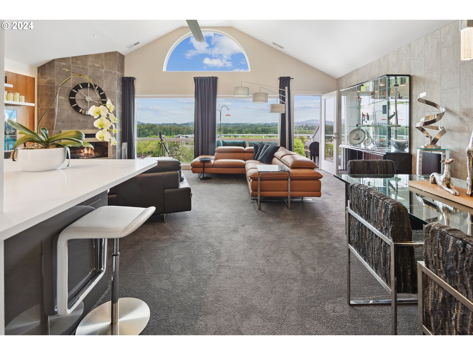 5427 Southwest View Point Terrace Portland, OR 97239 - Photo 11 of 40 a dining room with furniture and a large window