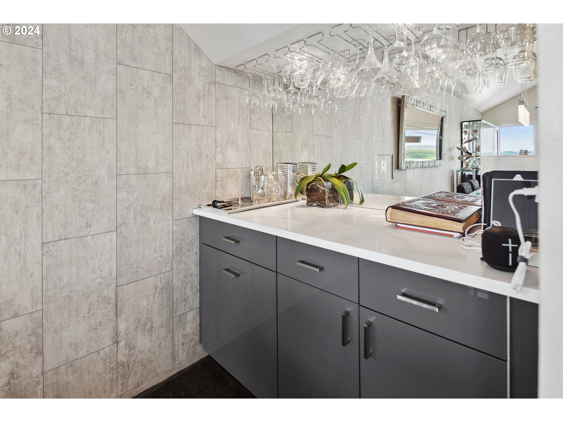 5427 Southwest View Point Terrace Portland, OR 97239 - Photo 13 of 40 a bathroom with a sink and a mirror