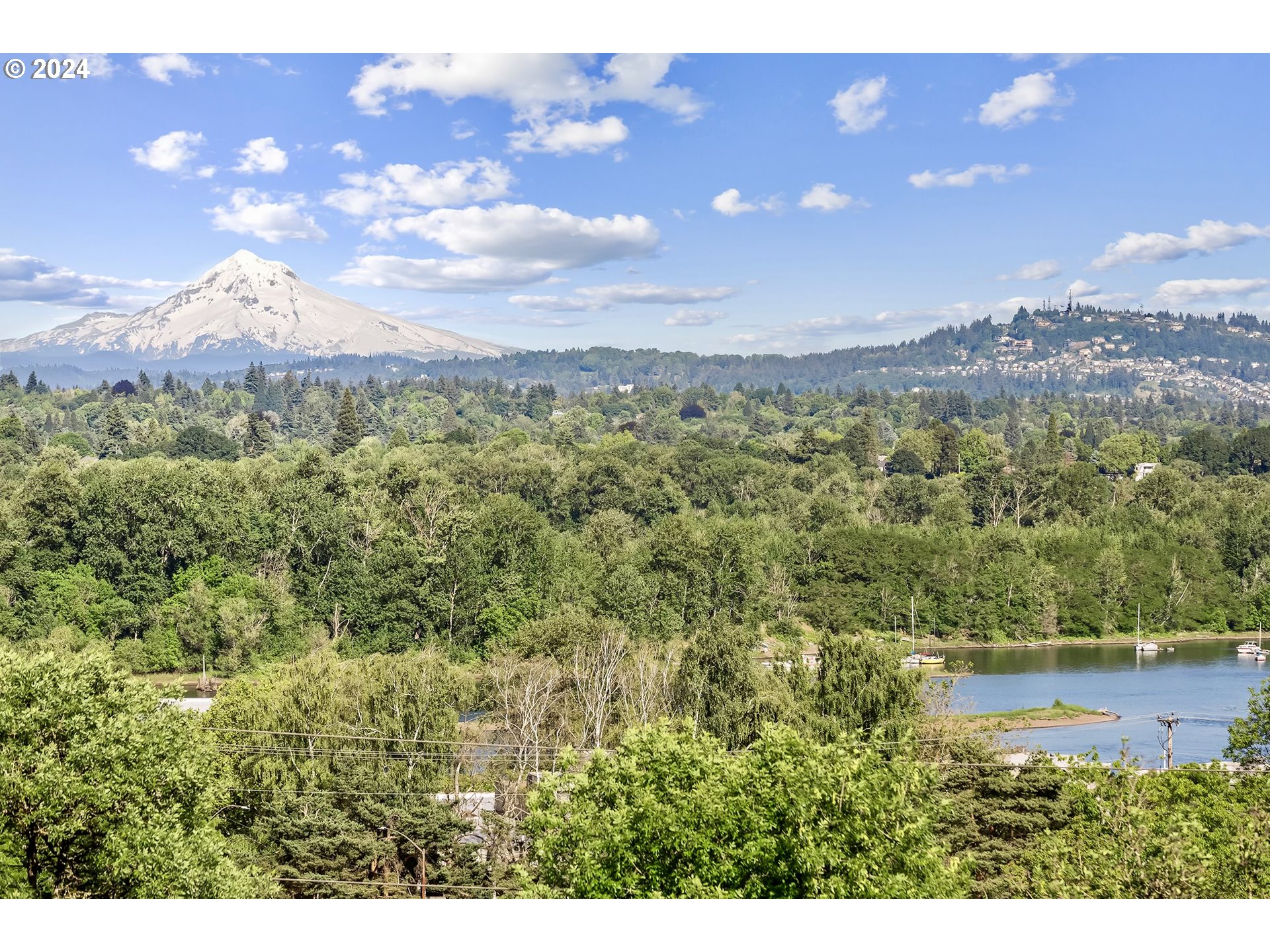 5427 Southwest View Point Terrace Portland, OR 97239 - Photo 2 of 40 a view of lake and mountain