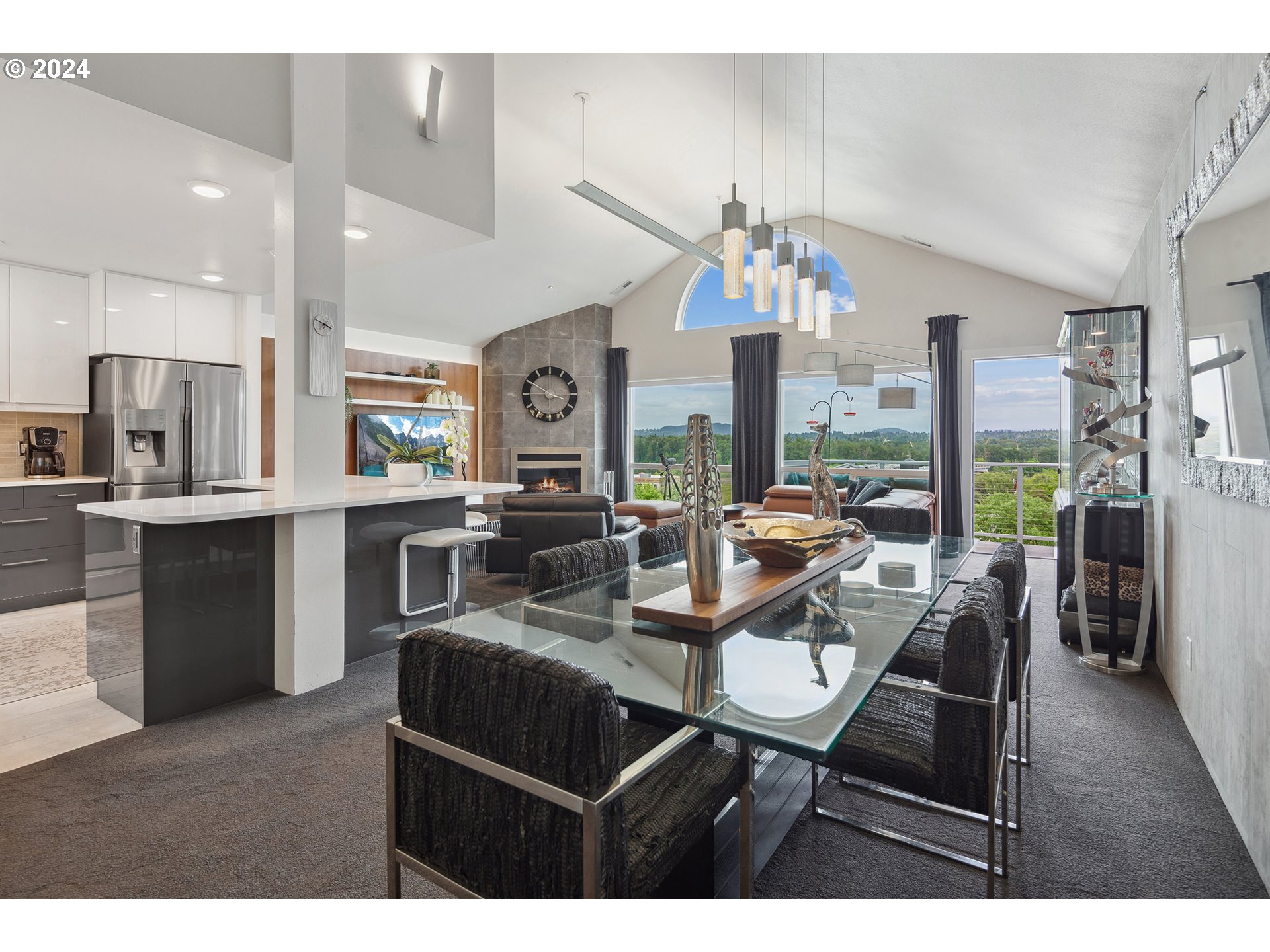 5427 Southwest View Point Terrace Portland, OR 97239 - Photo 27 of 40 a view of a dining room with furniture window and wooden floor