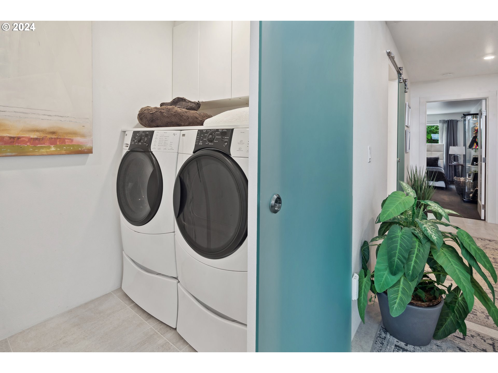 5427 Southwest View Point Terrace Portland, OR 97239 - Photo 31 of 40 a utility room with dryer and washer