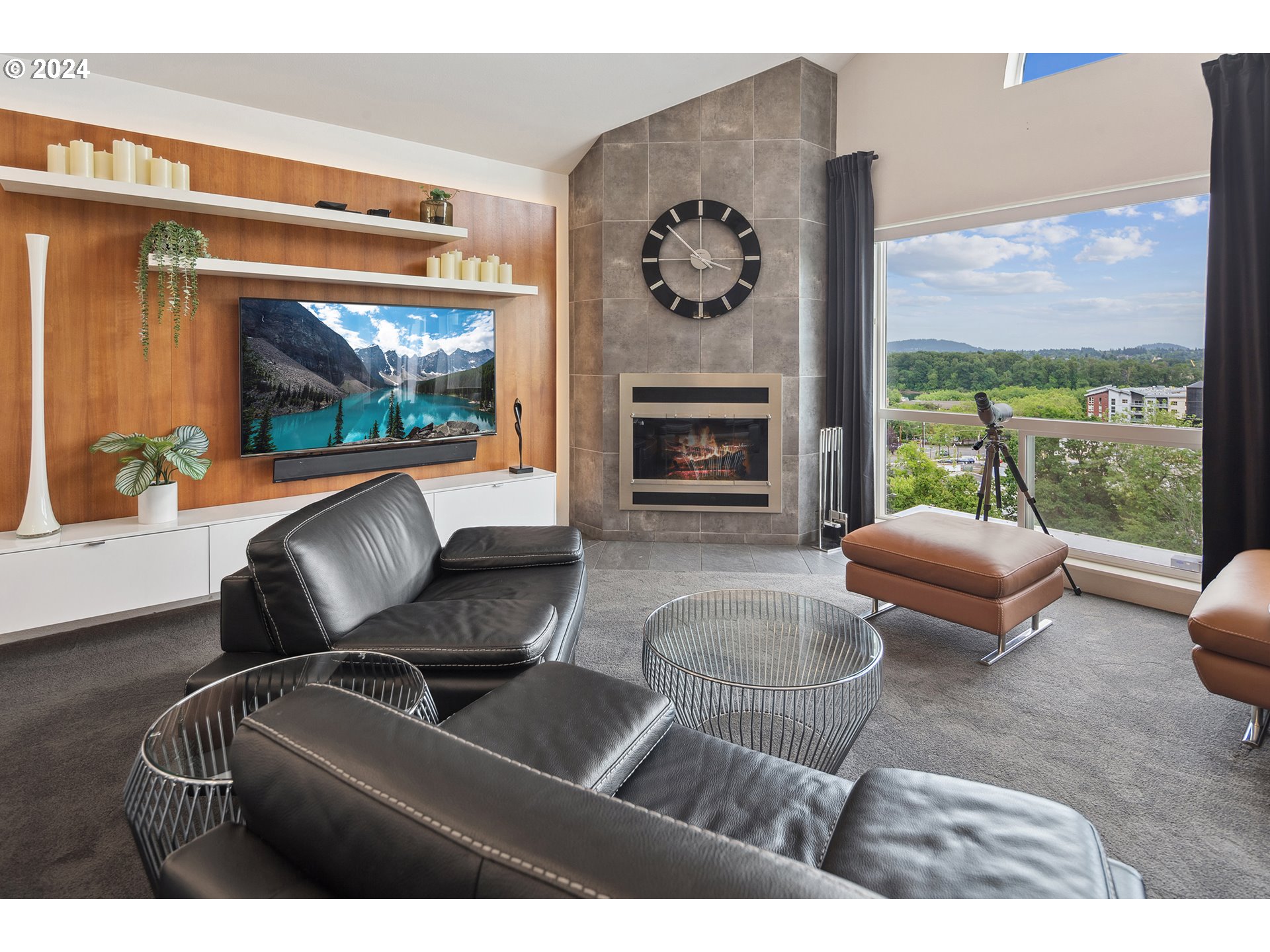 5427 Southwest View Point Terrace Portland, OR 97239 - Photo 32 of 40 a living room with furniture and a flat screen tv