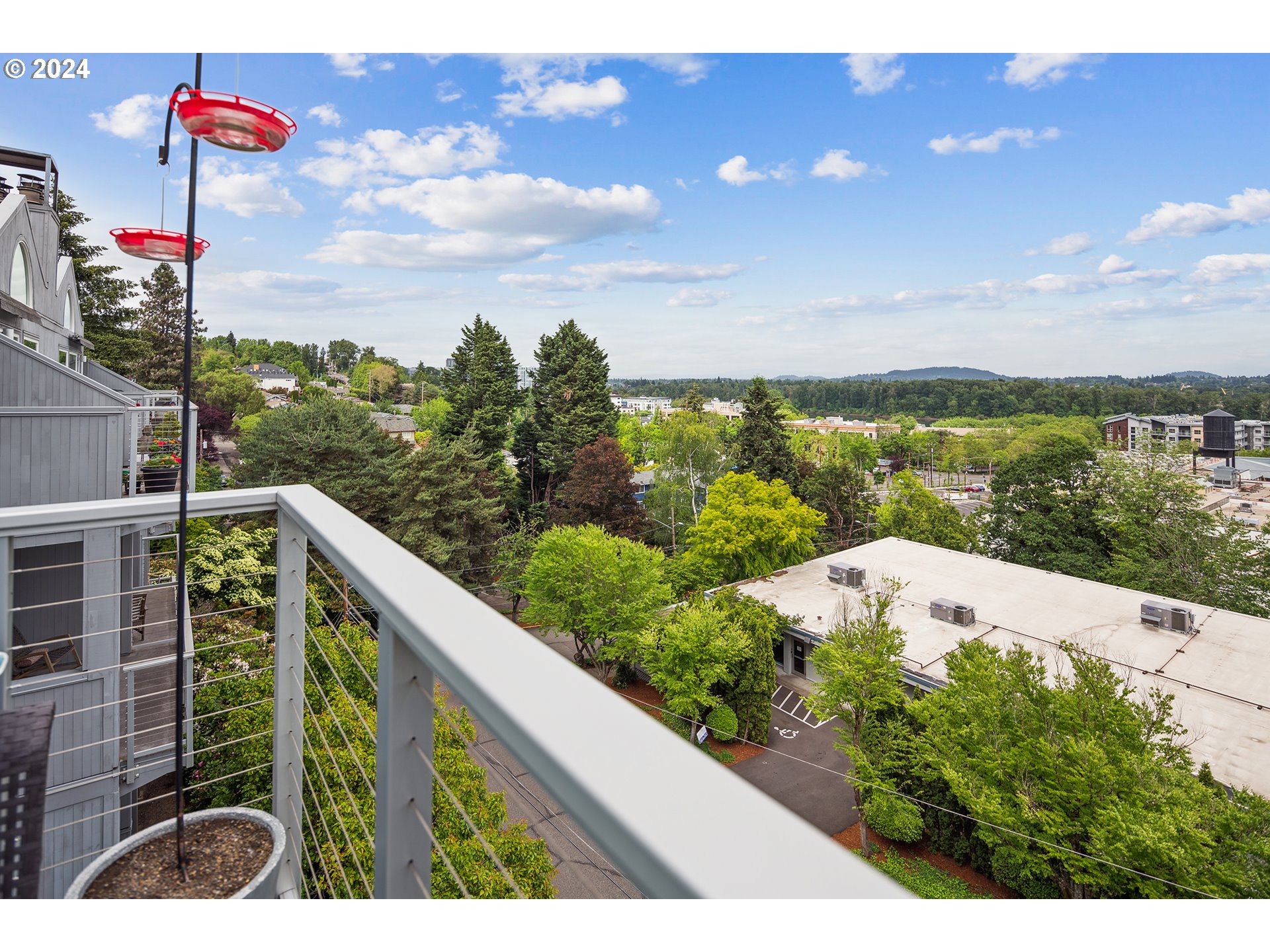 5427 Southwest View Point Terrace Portland, OR 97239 - Photo 37 of 40 a view of a city from a balcony
