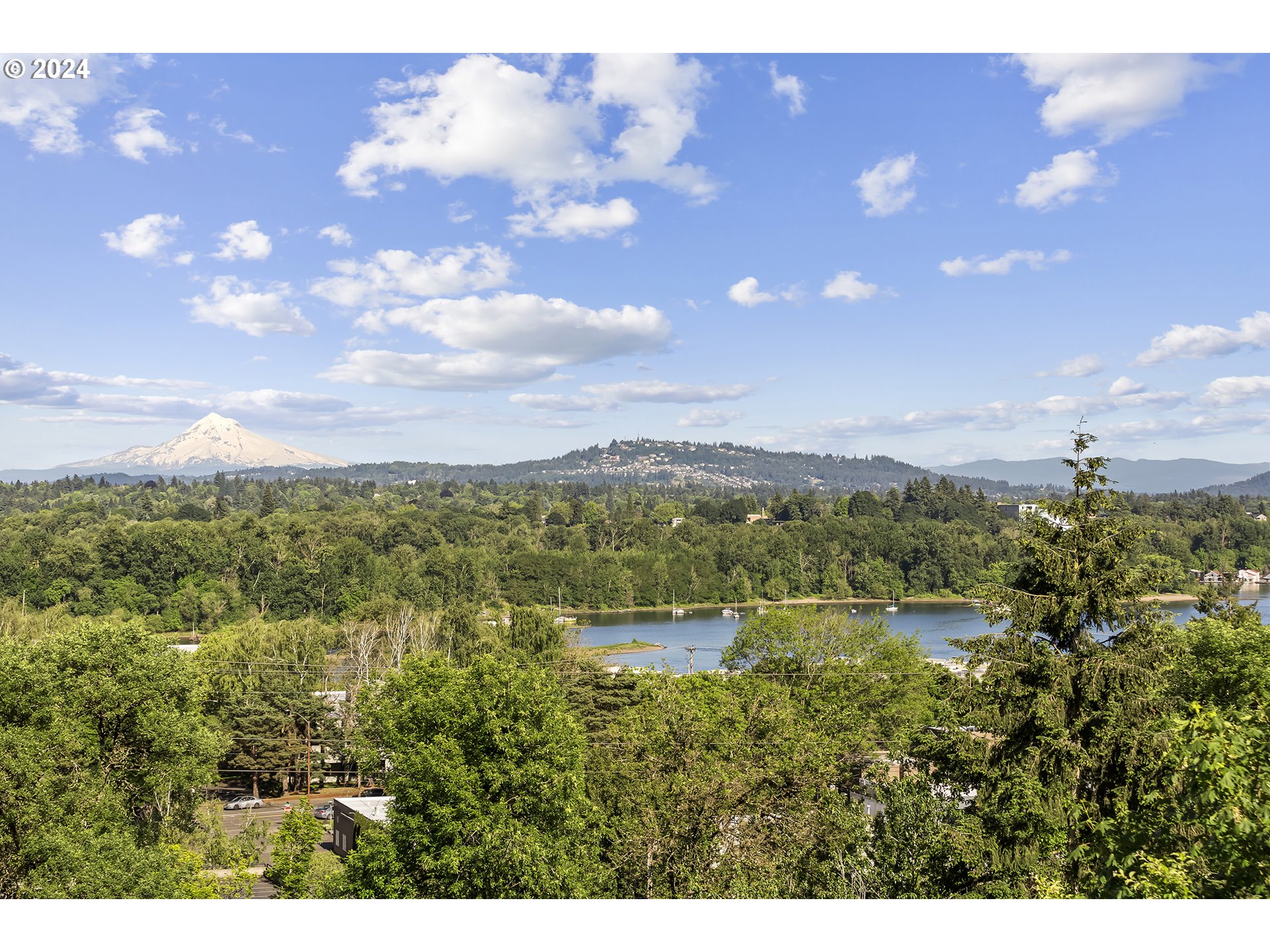 5427 Southwest View Point Terrace Portland, OR 97239 - Photo 38 of 40 a view of a lake in middle of the town