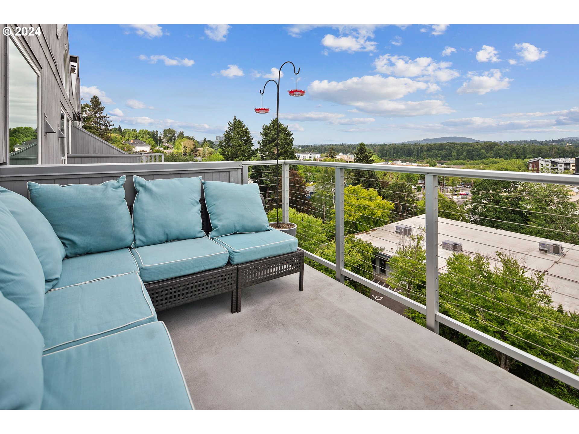 5427 Southwest View Point Terrace Portland, OR 97239 - Photo 4 of 40 a view of a patio with lawn chairs