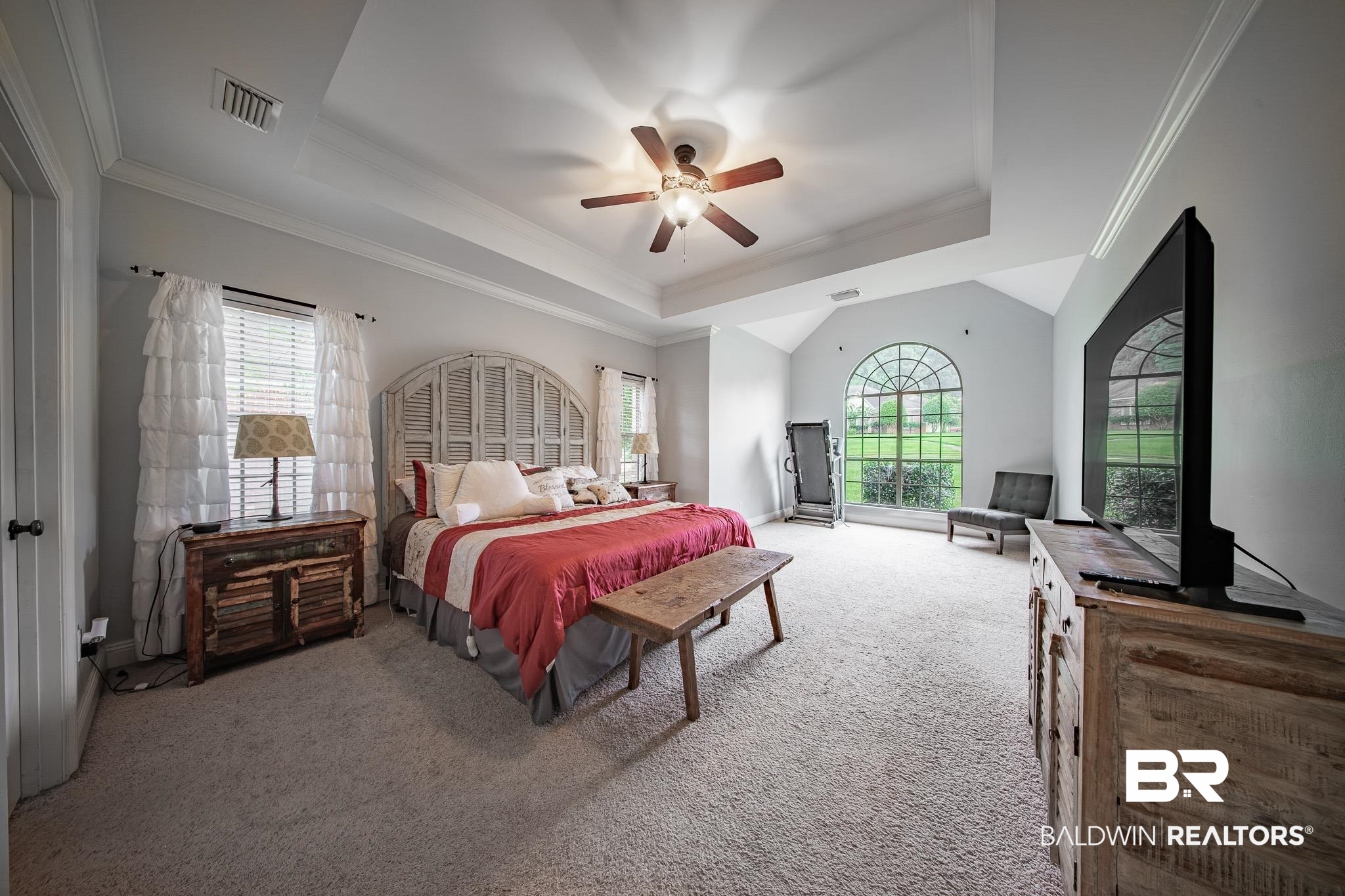 8421 Weatherford Court Daphne, AL 36527 - Photo 16 of 36 Bedroom featuring carpet floors, a raised ceiling, crown molding, and ceiling fan