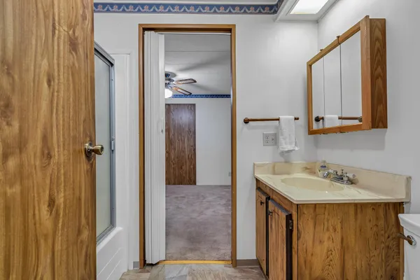 a view of a bathroom with toilet