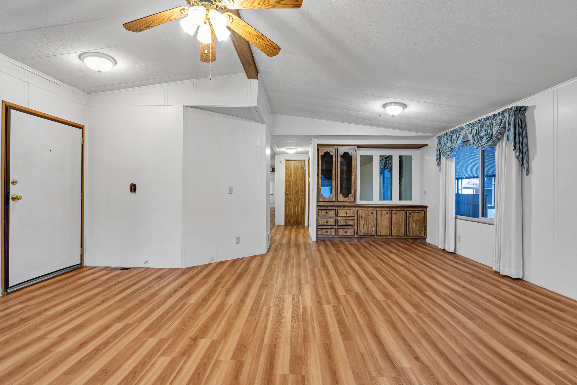 350 Gilmore Road, Unit SPC 88 Red Bluff, CA 96080 - Photo 3 of 31 a view of empty room with wooden floor