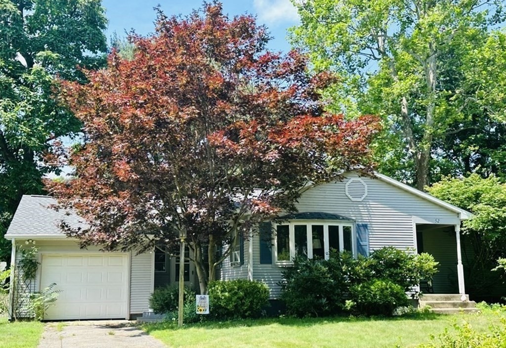 52 Embassy Road Springfield, MA 01119 - Photo 1 of 27 a front view of a house with garden