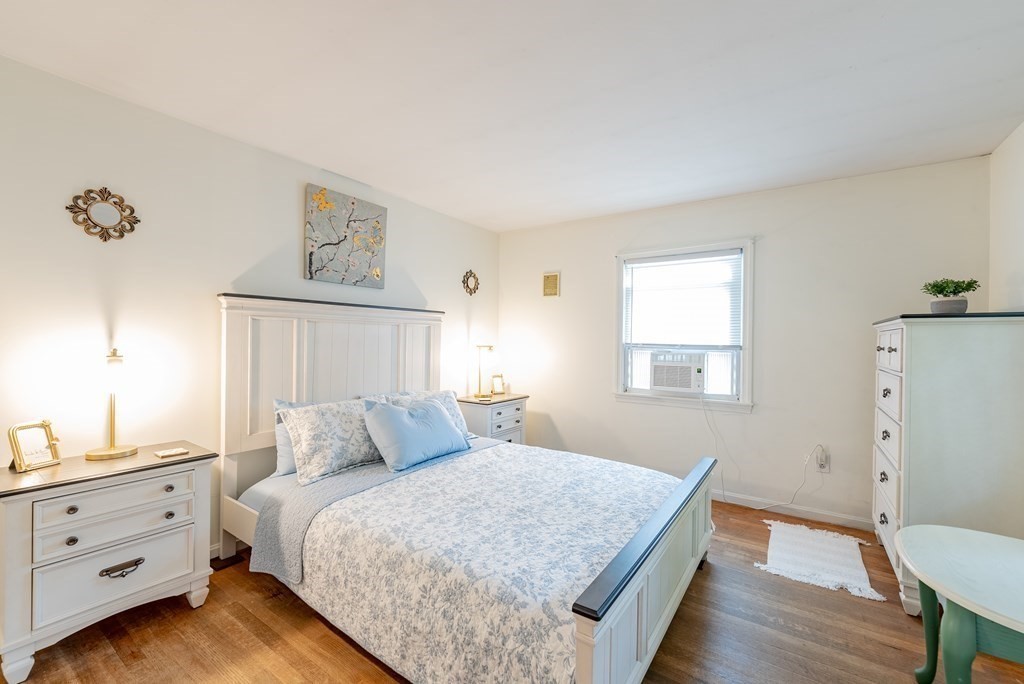 52 Embassy Road Springfield, MA 01119 - Photo 22 of 27 a bedroom with a bed and a window