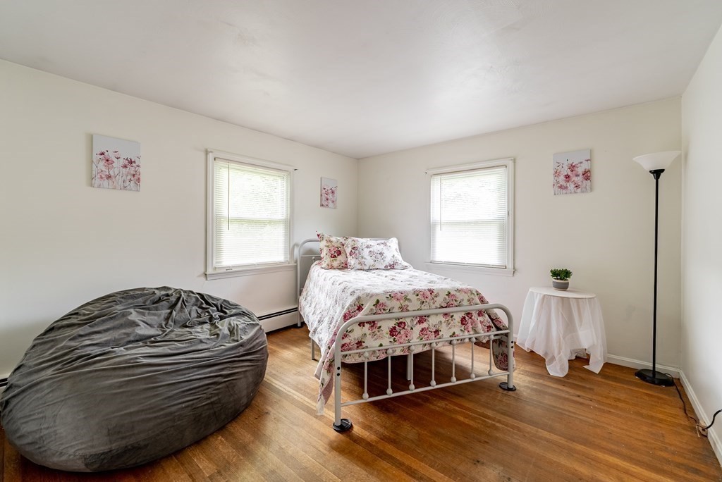 52 Embassy Road Springfield, MA 01119 - Photo 26 of 27 a bedroom with a bed and a window