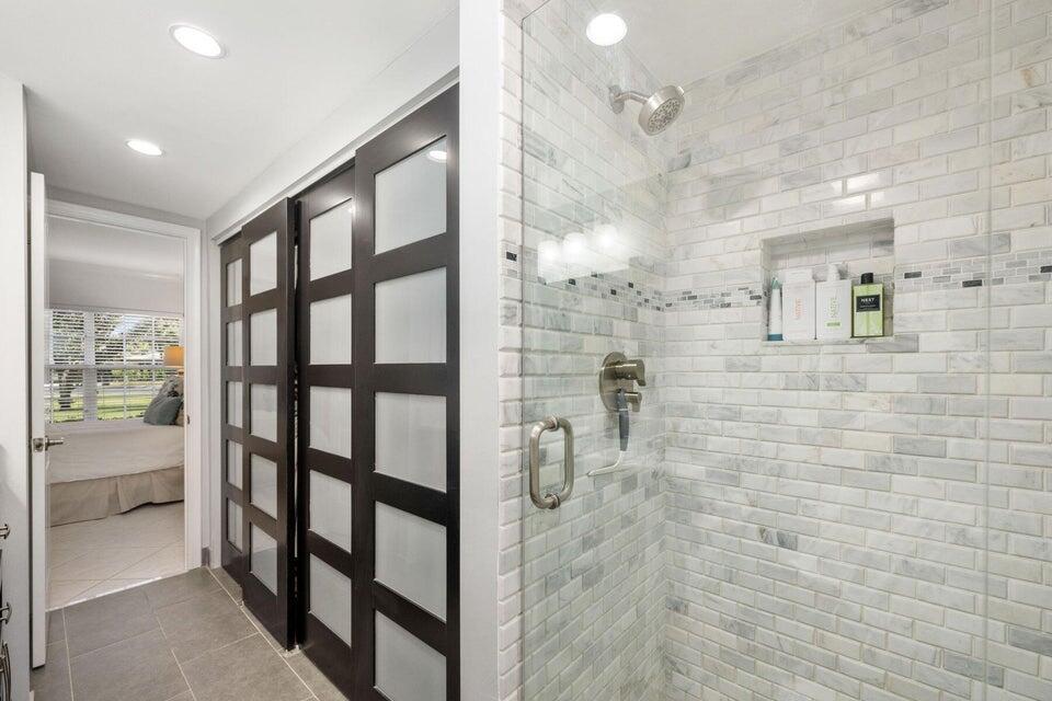 250 Northeast 20th Street, Unit 1010 Boca Raton, FL 33431 - Photo 10 of 23 adjacent closet in master bdrm