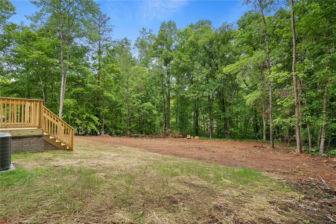 419 Austin Drive Anderson, SC 29624 - Photo 31 of 36 This verdant outdoor space features a natural landscape, ideal for peaceful enjoyment.