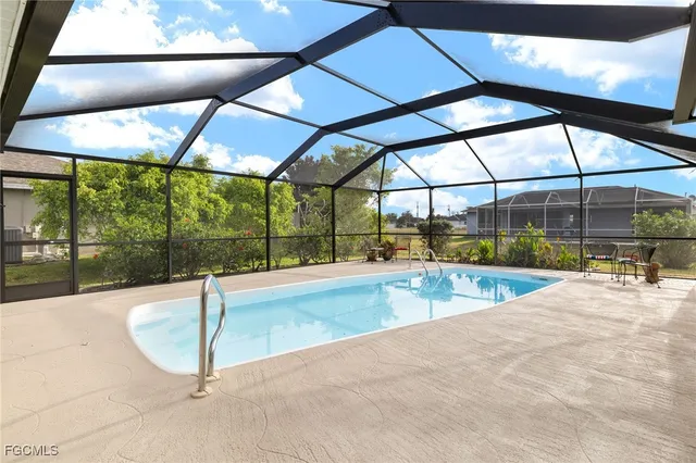 a view of a swimming pool with a porch