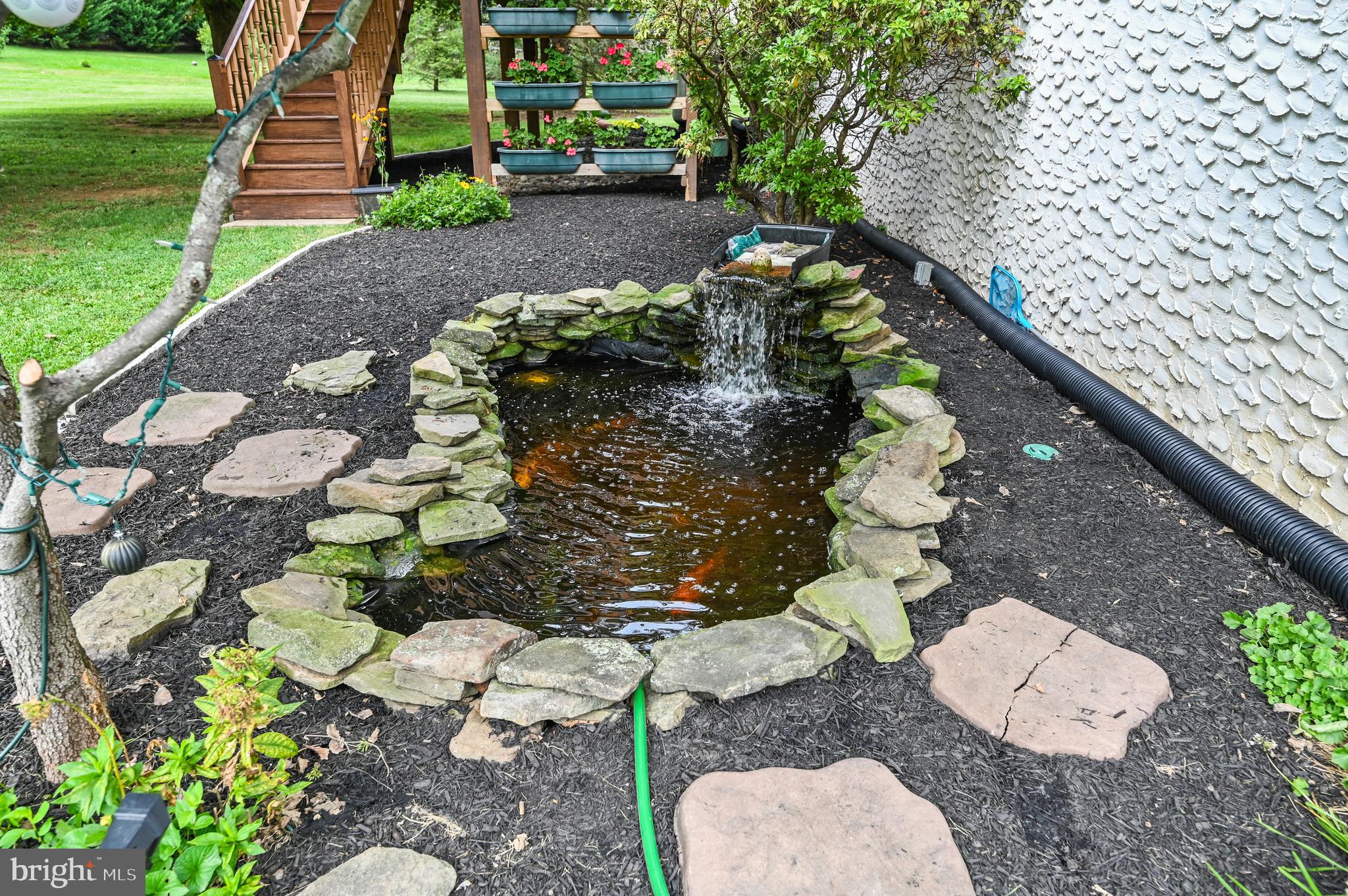 313 Faust Road Reading, PA 19608 - Photo 26 of 32 a backyard of a house with lots of green space