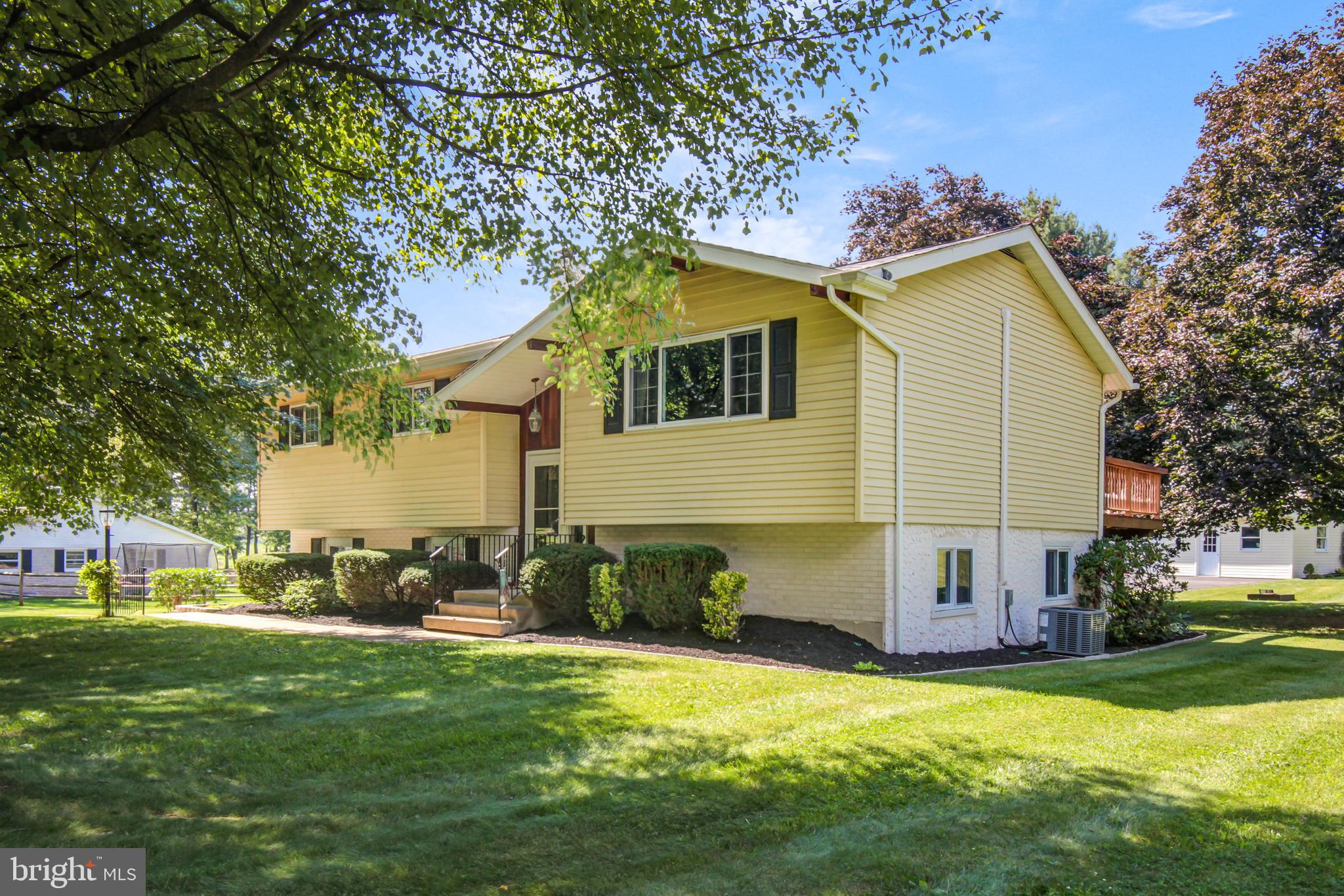 313 Faust Road Reading, PA 19608 - Photo 3 of 32 a view of a house with a backyard