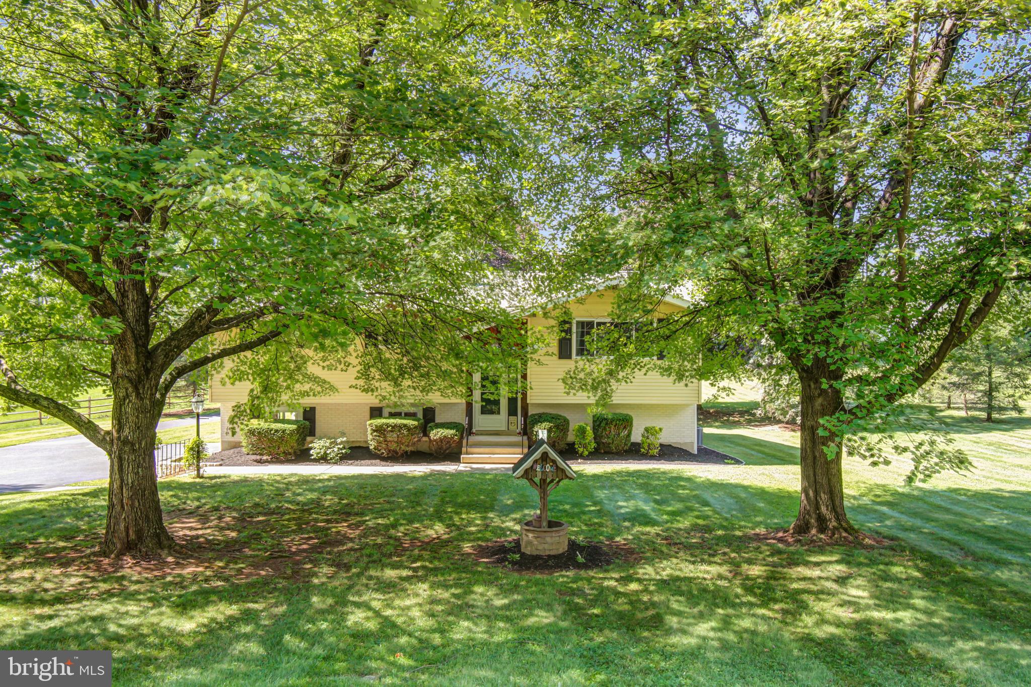313 Faust Road Reading, PA 19608 - Photo 4 of 32 a view of a yard with a tree