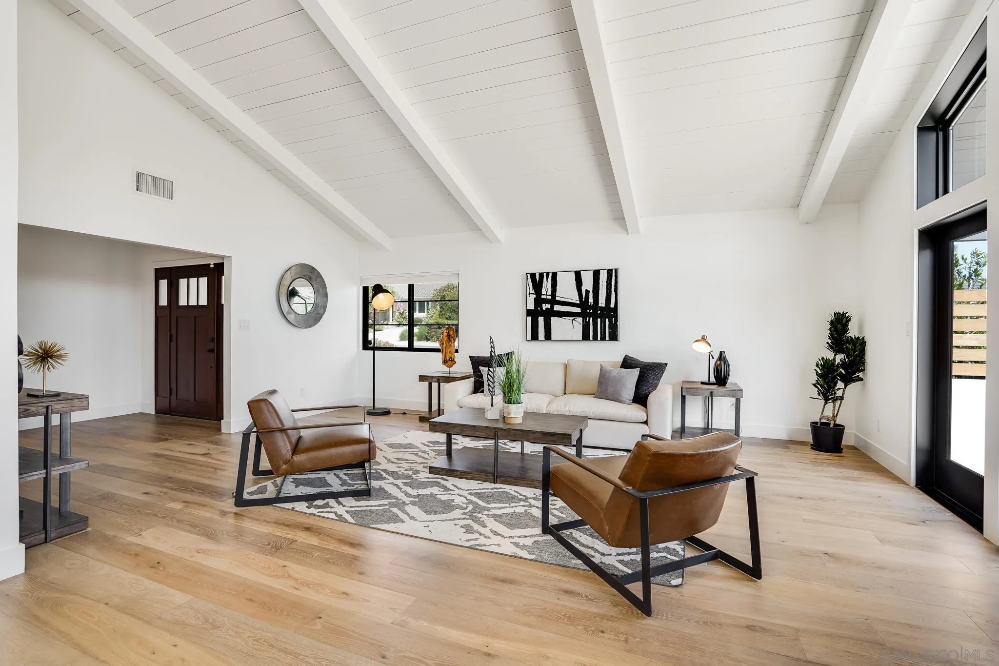 8804 Robinhood Lane La Jolla, CA 92037 - Photo 13 of 58 a living room with furniture