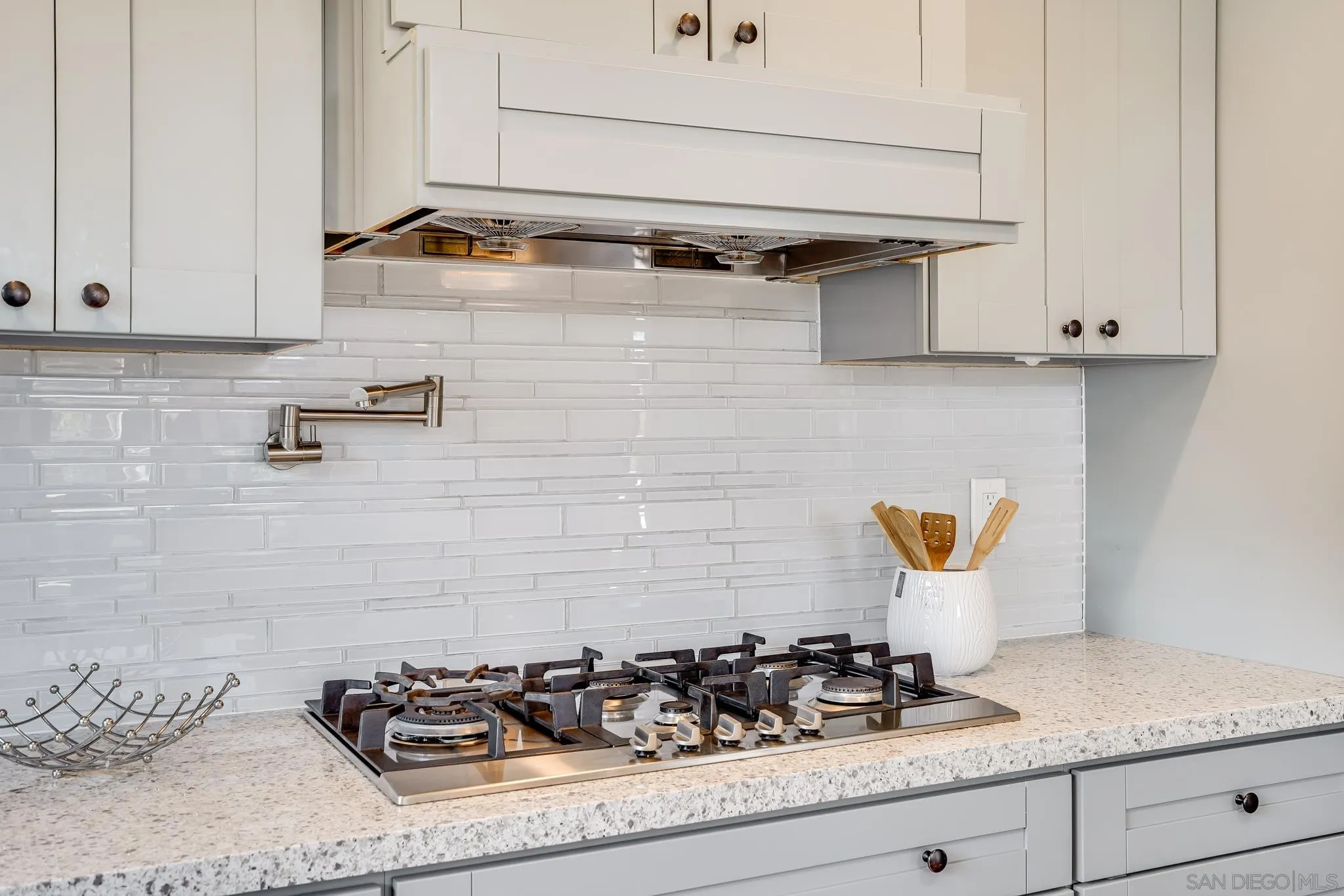 8804 Robinhood Lane La Jolla, CA 92037 - Photo 19 of 58 a bathroom with a sink and cabinets