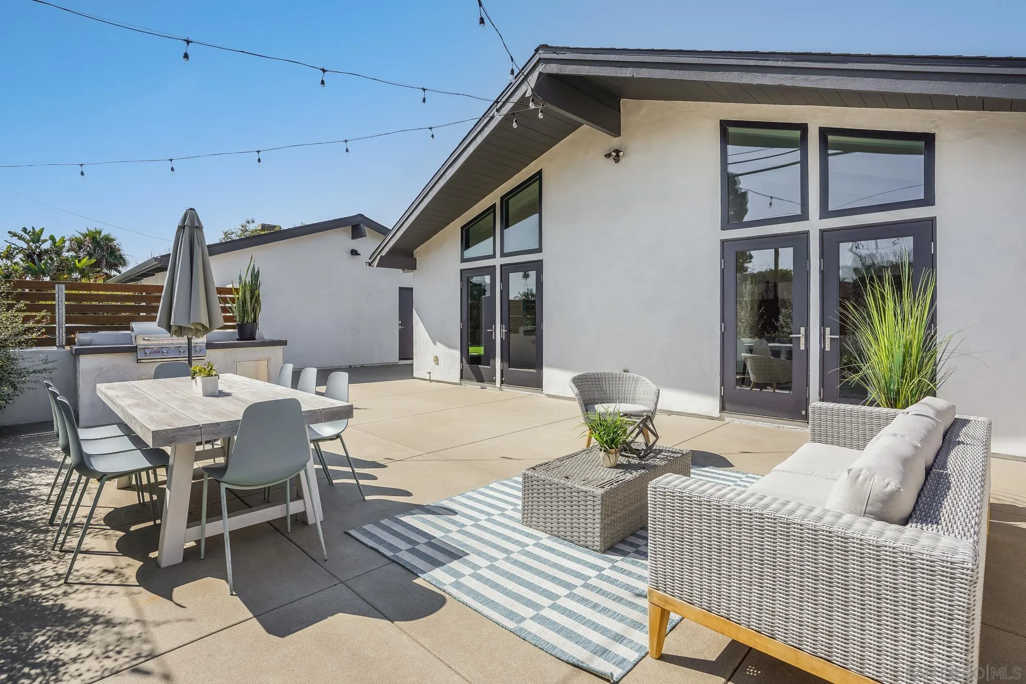 8804 Robinhood Lane La Jolla, CA 92037 - Photo 40 of 58 a dining room with furniture and window