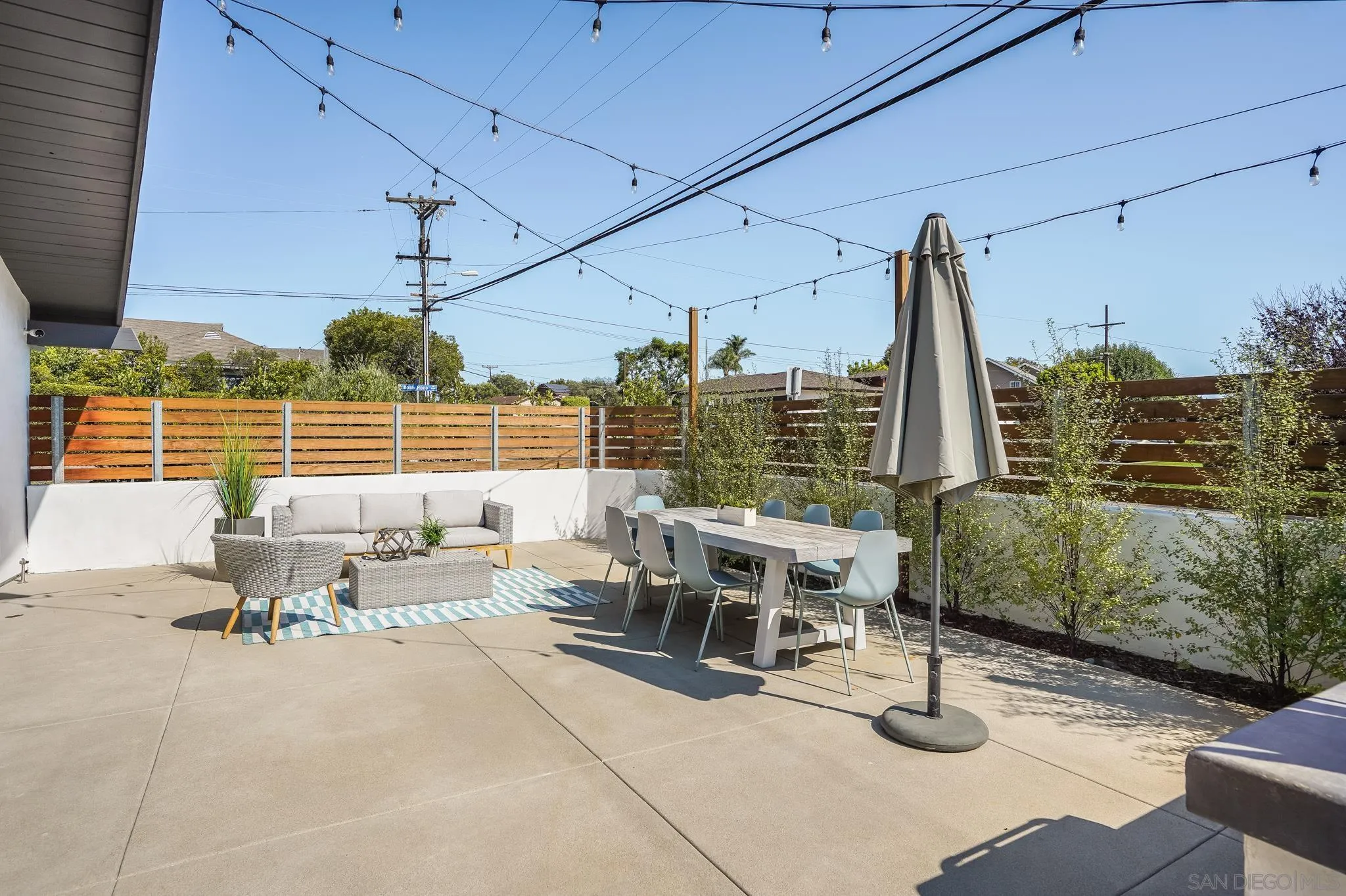 8804 Robinhood Lane La Jolla, CA 92037 - Photo 43 of 58 a view of a terrace with furniture