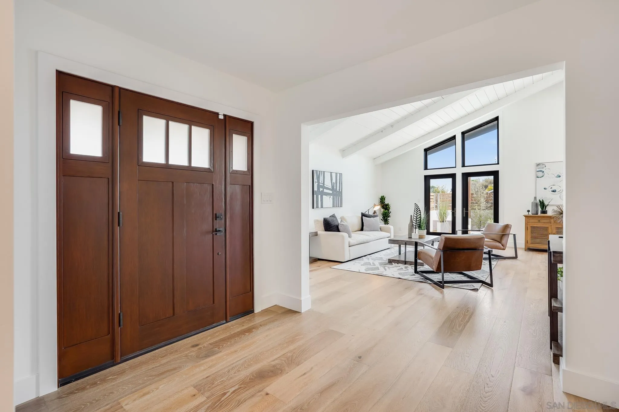 8804 Robinhood Lane La Jolla, CA 92037 - Photo 9 of 58 a living room with furniture window and wooden floor