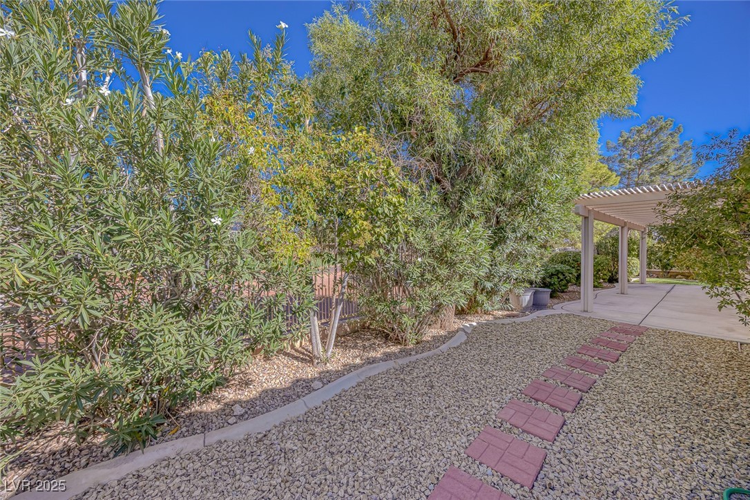 5333 Rim View Lane Las Vegas, NV 89130 - Photo 49 of 55 View of yard with a pergola and a patio area