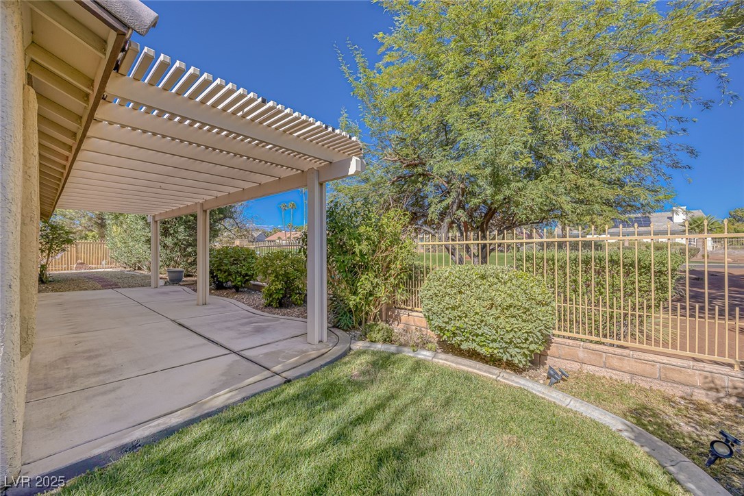 5333 Rim View Lane Las Vegas, NV 89130 - Photo 6 of 55 Fenced backyard featuring a pergola and a patio area