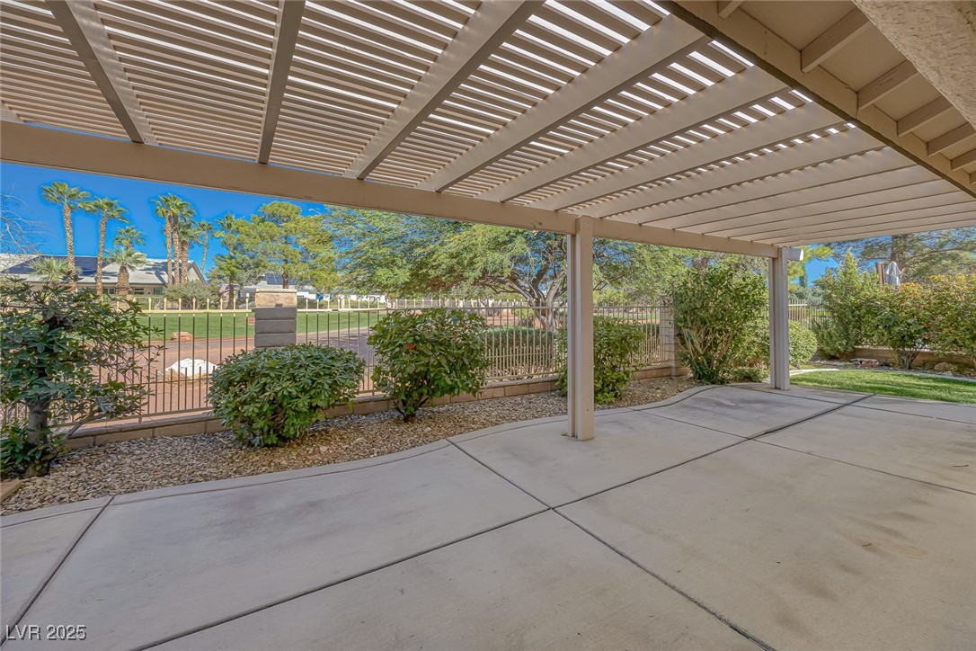 5333 Rim View Lane Las Vegas, NV 89130 - Photo 8 of 55 Fenced backyard featuring a pergola and a patio area