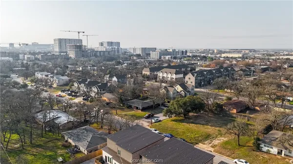an aerial view of residential house with outdoor space